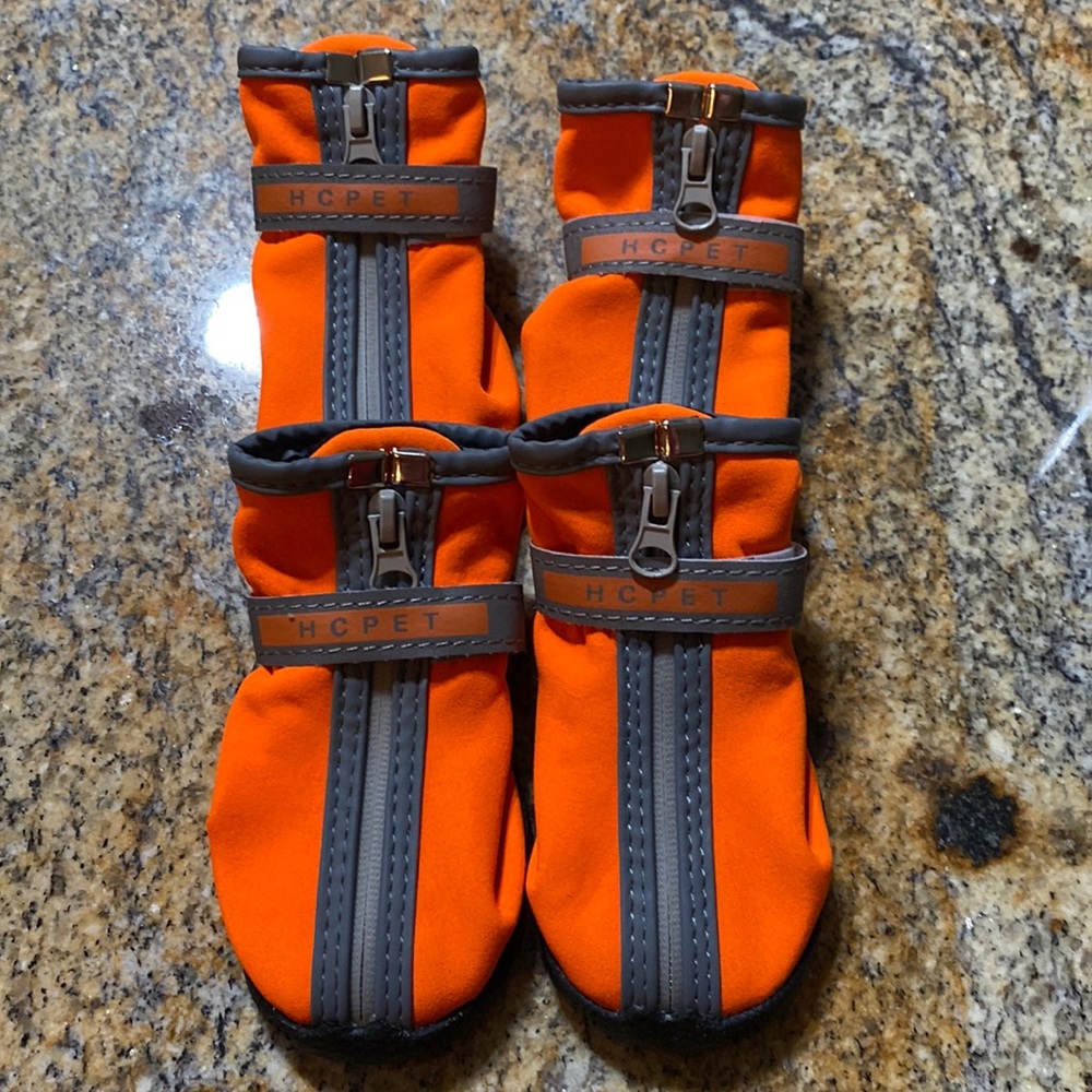 Dog shoes size small.